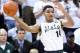 Jan 25, 2014; East Lansing, MI, USA; Michigan State Spartans guard Gary Harris (14) looks to pass the ball against Michigan Wolverines during the 1st half of a game at Jack Breslin Student Events Center. Mandatory Credit: Mike Carter-USA TODAY Sports