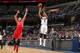 MEMPHIS, TN - JANUARY 25: Courtney Lee #5 of the Memphis Grizzlies shoots against the Houston Rockets on January 25, 2014 at FedExForum in Memphis, Tennessee. NOTE TO USER: User expressly acknowledges and agrees that, by downloading and or using this phot