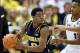 Jan 25, 2014; East Lansing, MI, USA; Michigan Wolverines guard Derrick Walton Jr. (10) looks to pass the ball against the Michigan State Spartans during the 2nd half of a game at Jack Breslin Student Events Center. Michigan won 80-75. Mandatory Credit: Mi