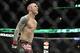Jan 25, 2014; Chicago, IL, USA; Eddie Wineland reacts after beating Yves Jabouin (not pictured) during UFC on FOX 10 at the United Center. Mandatory Credit: David Banks-USA TODAY Sports