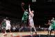 WASHINGTON, DC - JANUARY 22: Jeff Green #8 of the Boston Celtics shoots against Marcin Gortat #4 of the Washington Wizards during the game at the Verizon Center on January 22, 2014 in Washington, DC. NOTE TO USER: User expressly acknowledges and agrees th