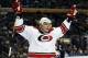 Jan 23, 2014; Buffalo, NY, USA; Carolina Hurricanes right wing Alexander Semin (28) celebrates after scoring his second goal of the night against the Buffalo Sabres during the third period at First Niagara Center. Hurricanes beat the Sabres 5-3. Mandatory