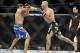 Jan 25, 2014; Chicago, IL, USA; Donald Cerrone (red gloves) fights Adriano Martins (blue gloves) during UFC on FOX 10 at the United Center. Mandatory Credit: David Banks-USA TODAY Sports