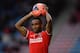 HUDDERSFIELD, ENGLAND - JANUARY 25: Cedric Evina of Charlton Athletic in action during the Budweiser FA Cup Fourth Round match between Huddersfield Town and Charlton Athletic at John Smith's Stadium on January 25, 2014 in Huddersfield, England. (Photo b