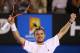 MELBOURNE, AUSTRALIA - JANUARY 26: Stanislas Wawrinka of Switzerland celebrates winning championship point in his men's final match against Rafael Nadal of Spain during day 14 of the 2014 Australian Open at Melbourne Park on January 26, 2014 in Melbourne
