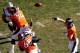 DENVER, CO - JANUARY 19: Peyton Manning #18 of the Denver Broncos throws a pass against the New England Patriots during the AFC Championship game at Sports Authority Field at Mile High on January 19, 2014 in Denver, Colorado. (Photo by Justin Edmonds/G
