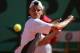 PARIS - JUNE 6: Guillermo Coria of Argentina returns in his men's final match against Gaston Gaudio of Argentina during Day Fourteen of the 2004 French Open Tennis Championship at Roland Garros on June 6, 2004 in Paris, France. (Photo by Clive Brunskill