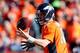 DENVER, CO - JANUARY 19: Peyton Manning #18 of the Denver Broncos in action against the New England Patriots during the AFC Championship game at Sports Authority Field at Mile High on January 19, 2014 in Denver, Colorado. (Photo by Kevin C. Cox/Getty Im