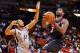 Jan 26, 2014; Miami, FL, USA; Miami Heat small forward LeBron James (6) shoots the ball as San Antonio Spurs point guard Cory Joseph (5) defends during the first half at American Airlines Arena. Mandatory Credit: Steve Mitchell-USA TODAY Sports