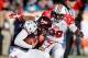Jan 25, 2014; Mobile, AL, USA; South squad defensive end Dee Ford of Auburn (30) sacks North squad quarterback Logan Thomas of Virginia Tech (3) during the first half of a game at Ladd-Peebles Stadium. Mandatory Credit: Derick E. Hingle-USA TODAY Sports