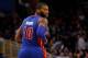 Dec 27, 2013; Orlando, FL, USA; Detroit Pistons power forward Greg Monroe (10) looks back after he made a basket against the Orlando Magic during the second quarter at Amway Center. Mandatory Credit: Kim Klement-USA TODAY Sports