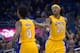 Nick Young extends a hand.