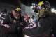 ASPEN, CO - JANUARY 23: Wade Moore (L) helps apply the equipment to his son Colten Moore (R) during the snowmobile freestyle finals at Winter X-Games 2014 Aspen at Buttermilk Mountain on January 23, 2014 in Aspen, Colorado. Colten Moore went on to win th
