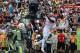 January 26, 2014; Honolulu, HI, USA; Team Rice wide receiver Josh Gordon of the Cleveland Browns (12) catches a touchdown pass against Team Sanders cornerback Darrelle Revis of the Tampa Bay Buccaneers (24, left) and safety Eric Weddle of the San Diego Ch