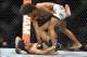 Jan 25, 2014; Chicago, IL, USA; Alex Caceres (red gloves) fights Sergio Pettis (blue gloves) during UFC on FOX 10 at the United Center. Mandatory Credit: David Banks-USA TODAY Sports