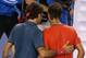 MELBOURNE, AUSTRALIA - JANUARY 24: Rafael Nadal of Spain shakes hands with Roger Federer of Switzerland after Nadal won their semifinal match during day 12 of the 2014 Australian Open at Melbourne Park on January 24, 2014 in Melbourne, Australia. (Photo