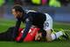 CARDIFF, WALES - NOVEMBER 24: Manchester United player Wayne Rooney (r) clashes with Jordon Mutch for a challenge which Rooney is booked during the Barclays Premier League match between Cardiff City and Manchester United at Cardiff City Stadium on Novemb
