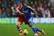 SOUTHAMPTON, ENGLAND - JANUARY 01: Ashley Cole of Chelsea holds off Steven Davis of Southampton during the Barclays Premier League match between Southampton and Chelsea at St Mary's Stadium on January 1, 2014 in Southampton, England. (Photo by Warren Li