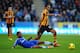 HULL, ENGLAND - JANUARY 11: Ashley Cole of Chelsea tackles Ahmed Elmohamady of Hull City during the Barclays Premier League match between Hull City and Chelsea at KC Stadium on January 11, 2014 in Hull, England. (Photo by Laurence Griffiths/Getty Images
