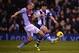 WEST BROMWICH, ENGLAND - NOVEMBER 25: Shane Long of West Bromwich Albion battles with Ron Vlaar of Aston Villa during the Barclays Premier League match between West Bromwich Albion and Aston Villa at The Hawthorns on November 25, 2013 in West Bromwich, E