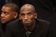 PHOENIX, AZ - JANUARY 15: Kobe Bryant #24 of the Los Angeles Lakers watches from the bench during the NBA game against the Phoenix Suns at US Airways Center on January 15, 2014 in Phoenix, Arizona. NOTE TO USER: User expressly acknowledges and agrees th