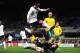 IPSWICH, ENGLAND - OCTOBER 15: Tom Ince of England jumps Lukas Lidakevicius of Lithuania during the 2015 UEFA European U21 Championships Qualifying Group One match between England U21 and Lithuania U21 at Portman Road on October 15, 2013 in Ipswich, Eng