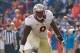 Nov 30, 2013; Gainesville, FL, USA; Florida State Seminoles defensive tackle Timmy Jernigan (8) against the Florida Gators during the second half at Ben Hill Griffin Stadium. Florida State Seminoles defeated the Florida Gators 37-7. Mandatory Credit: Kim