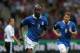 WARSAW, POLAND - JUNE 28: Mario Balotelli of Italy celebrates scoring the opening goal during the UEFA EURO 2012 semi final match between Germany and Italy at the National Stadium on June 28, 2012 in Warsaw, Poland. (Photo by Joern Pollex/Getty Images)