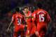 LIVERPOOL, ENGLAND - JANUARY 18: Steven Gerrard of Liverpool celebrates scoring his penalty with team mates during the Barclays Premier League match between Liverpool and Aston Villa at Anfield on January 18, 2014 in Liverpool, England. (Photo by Michael