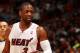 MIAMI, FL - JANUARY 7: Dwyane Wade #3 of the Miami Heat looks on against the New Orleans Pelicans at the American Airlines Arena in Miami, Florida on Jan. 7, 2014. NOTE TO USER: User expressly acknowledges and agrees that, by downloading and/or using this