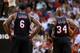 MIAMI, FL - JANUARY 26: LeBron James #6 and Ray Allen #34 of the Miami Heat look on during a game against the San Antonio Spurs at American Airlines Arena on January 26, 2014 in Miami, Florida. NOTE TO USER: User expressly acknowledges and agrees that, by