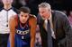 PORTLAND, OR - JANUARY 4: Michael Carter-Williams #1 and Brett Brown of the Philadelphia 76ers talk during the game against the Portland Trail Blazers on January 4, 2014 at the Moda Center Arena in Portland, Oregon. NOTE TO USER: User expressly acknowled
