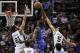 Jan 22, 2014; San Antonio, TX, USA; Oklahoma City Thunder forward Kevin Durant (35) goes up for a dunk as San Antonio Spurs forward Tim Duncan (21) and guard Cory Joseph (5) defend during the second half at AT&T Center. The Thunder won 111-105. Mandatory