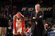 NEW YORK, NY - APRIL 12: Carmelo Anthony #7 of the New York Knicks and head coach Mike D'Antoni share a laugh during a break in the action against the Chicago Bulls on April 12, 2011 at Madison Square Garden in New York City. NOTE TO USER: User expressl