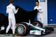 JEREZ DE LA FRONTERA, SPAIN - JANUARY 28: (L-R) Nico Rosberg of Germany and Mercedes GP and Lewis Hamilton of Great Britain and Mercedes GP unveil the new Mercedes W05 during day one of Formula One Winter Testing at the Circuito de Jerez on January 28, 2