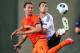 PETAH TIQWA, ISRAEL - JUNE 06: Luuk de Jong (L) of Netherlands is challenged by Stefan Thesker of Germany during the UEFA European Under 21 Championship match between Netherlands and Germany at Ha Moshava Stadium on June 6, 2013 in Petah Tiqwa, Israel. (