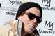 MAMMOTH, CA - JANUARY 19: Shaun White reacts after he is introduced as a member of the United States Olympic team for both Snowboarding Slopestyle and Halfpipe at the 2014 Sprint U.S. Snowboarding Grand Prix at Mammoth Mountain Resort on January 19, 2014