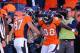 DENVER, CO - JANUARY 19: Demaryius Thomas #88 celebrates his third quarter touchdown with Eric Decker #87 of the Denver Broncos during the AFC Championship game against the New England Patriots at Sports Authority Field at Mile High on January 19, 2014