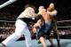 The Wyatt Family attack John Cena.