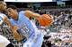 Dec 4, 2013; East Lansing, MI, USA;North Carolina Tar Heels forward James Michael McAdoo (43) drives the baseline Michigan State Spartans center Adreian Payne (5) during the 1st half a game at Jack Breslin Student Events Center. Mandatory Credit: Mike Ca