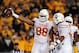 Nov 9, 2013; Morgantown, WV, USA; Texas Longhorns defensive end Cedric Reed (88) reacts after recovering a fumble in the second quarter against the West Virginia Mountaineers at Milan Puskar Stadium. Mandatory Credit: Evan Habeeb-USA TODAY Sports