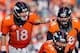DENVER, CO - JANUARY 19: Peyton Manning #18 of the Denver Broncos calls a play against the New England Patriots during the AFC Championship game at Sports Authority Field at Mile High on January 19, 2014 in Denver, Colorado. (Photo by Kevin C. Cox/Gett