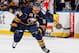 BUFFALO, NY - JANUARY 09: Matt Moulson #26 of the Buffalo Sabres skates against the Florida Panthers on January 9, 2014 at the First Niagara Center in Buffalo, New York. (Photo by Bill Wippert/NHLI via Getty Images)