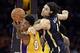 Jan 28, 2014; Los Angeles, CA, USA; Indiana Pacers power forward Luis Scola (4) defends against Los Angeles Lakers small forward Nick Young (0) during the first half at Staples Center. Mandatory Credit: Richard Mackson-USA TODAY Sports