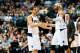 Jan 26, 2014; Dallas, TX, USA; Dallas Mavericks shooting guard Vince Carter (right) celebrates a score with point guard Jose Calderon (left) during the game against the Detroit Pistons at American Airlines Center. Mandatory Credit: Kevin Jairaj-USA TODAY