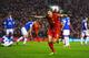 LIVERPOOL, ENGLAND - JANUARY 28: Steven Gerrard of Liverpool celebrates after scoring the opening goal during the Barclays Premier League match between Liverpool and Everton at Anfield on January 28, 2014 in Liverpool, England. (Photo by Laurence Griffi