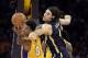 Jan 28, 2014; Los Angeles, CA, USA; Indiana Pacers power forward Luis Scola (4) defends against Los Angeles Lakers small forward Nick Young (0) during the first half at Staples Center. Mandatory Credit: Richard Mackson-USA TODAY Sports