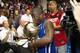 ORLANDO, FL - FEBRUARY 24: Comedian Kevin Hart of the East team celebrates his MVP award during the Sprint All-Star Celebrity Game on center court at Jam Session during the NBA All-Star Weekend on February 24, 2012 at the Orange County Convention Center i