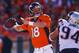 DENVER, CO - JANUARY 19: Peyton Manning #18 of the Denver Broncos looks to pass in the first quarter against the New England Patriots during the AFC Championship game at Sports Authority Field at Mile High on January 19, 2014 in Denver, Colorado. (Phot