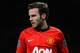 MANCHESTER, ENGLAND - JANUARY 28: New signing Juan Mata of Manchester United looks on during the Barclays Premier League match between Manchester United and Cardiff City at Old Trafford on January 28, 2014 in Manchester, England. (Photo by Michael Regan